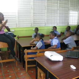 Versia addressing the Class 4 students at Workman's Primary School